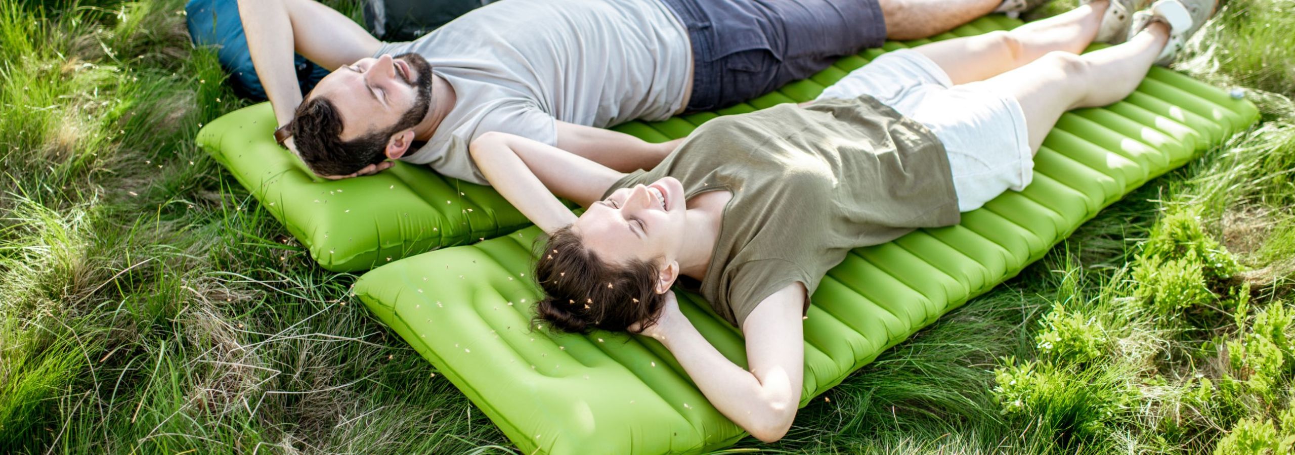 couple-relaxing-at-the-campsite-in-the-mountains-2023-11-27-05-14-22-utc 1.jpg